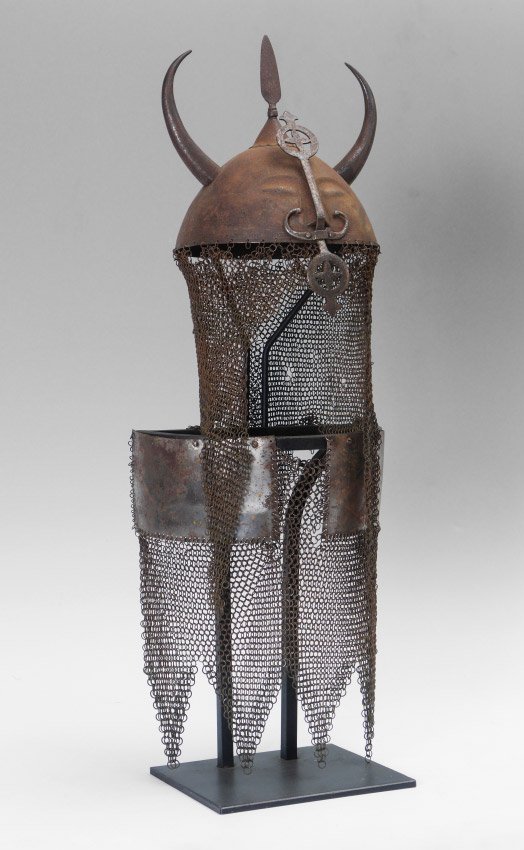 INDO-PERSIAN HORNED DEMON STEEL HELMET: INDO-PERSIAN HORNED DEMON STEEL HELMET: 19th Century, officers helmet and chest protector. Damascene steel helmet "Horned Demon" stylized face front, horns and spear finial, additional applied decorat
