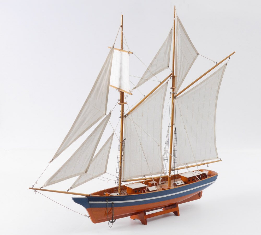 SCHOONER SHIPS MODEL: SCHOONER SHIPS MODEL: Nicely detailed model of an unnamed schooner with blue and white stripe, most likely from a kit. Measures 32 3/4" h. x 35 1/2" x 6".