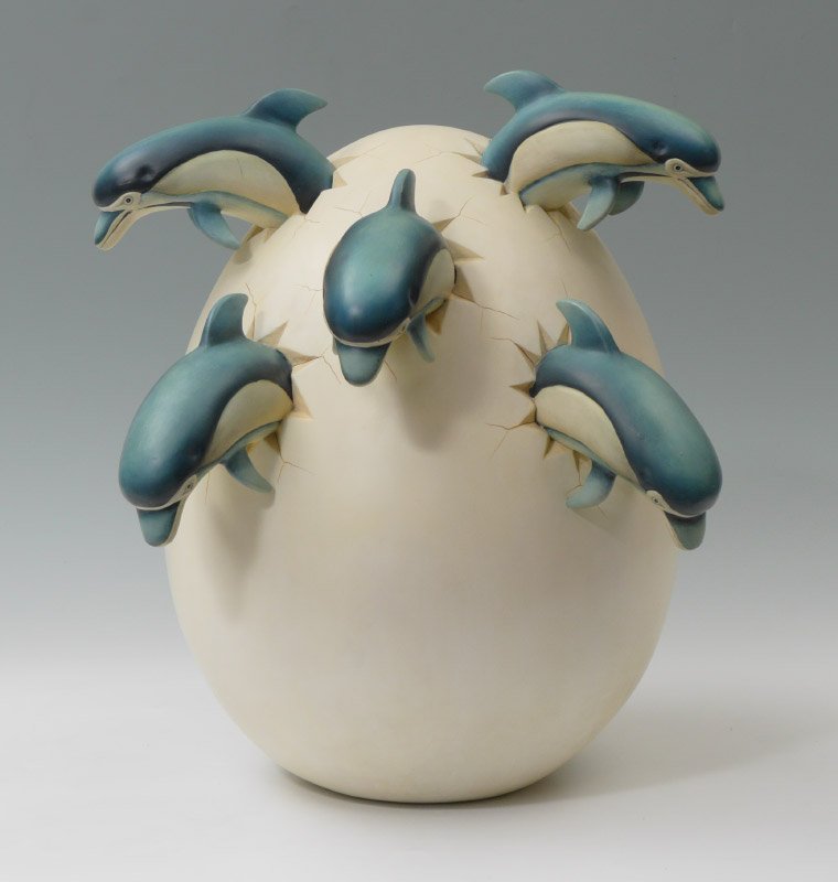 BUSTAMANTE UNIQUE EGG W/DOLPHINS: BUSTAMANTE, Sergio (Mexican, 1942-): ''Egg #5 with Dolphins'', Unique, 19'' x 17'' x 15'', signed, and sold with COA from the artist.