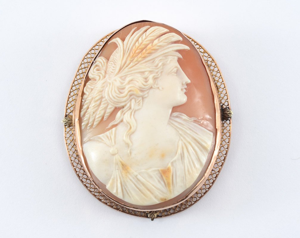 CARVED CAMEO OF SIF GODDESS OF GRAIN 18K BROOCH: MONUMENTAL 18K CARVED CAMEO BROOCH PENDANT: Depicting Sif, golden haired goddess of grain. Shell carved cameo in 18k gold frame. Measures 2.5 x 2.25.