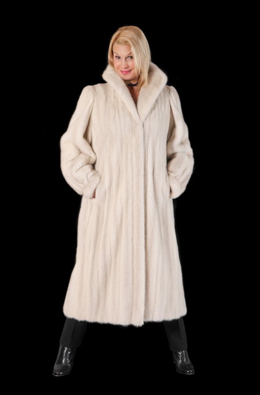 FULL LENGTH WHITE MINK FUR COAT: WHITE MINK FULL LENGTH FUR COAT: Natural Azurene female pelts. Murphys Lewiston Maine label and bill of sale dated 1986 for $4,250. Stand up collar, fitted cuffs, velvet lined pockets. Maintained in c