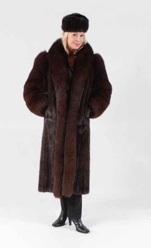 MINK AND FOX FUR FULL LENGTH COAT: FULL LENGTH BROWN MINK AND FOX FUR COAT: Mink coat with fox trim, collar and sleeves sold with hat. Deborah label. Measures approx. 46'' collar to cuff, 21'' shoulder to shoulder and 23'' shoulder to
