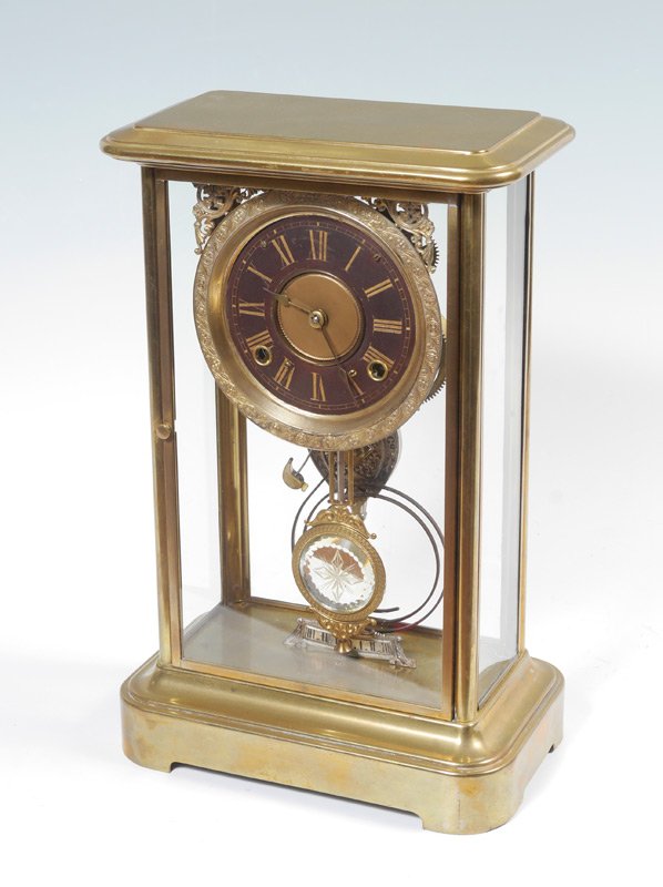 ANSONIA LARGE CRYSTAL REGULATOR CLOCK RUBBER DIAL: ANSONIA LARGE CRYSTAL REGULATOR CLOCK RUBBER DIAL: Brass case with glass front, back and side windows. Unique dial with embossed bezel, rare experimental hard rubber chapter ring with Roman numerals. 