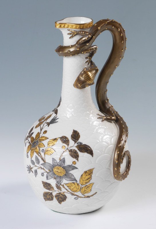 ROYAL WORCESTER DRAGON VASE: ROYAL WORCESTER DRAGON VASE: Quilted body, floral motif, applied figural dragon handle. 11 1/4'' x 6''.