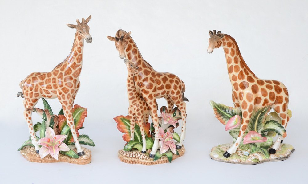 3 FITZ AND FLOYD PORCELAIN GIRAFFE FIGURINES: 3 PIECE FITZ AND FLOYD PORCELAIN GIRAFFE FIGURINES: 3 piece total, 2 singles and one mother and child, tallest measures 16 1/4" h. x 10" x 6".