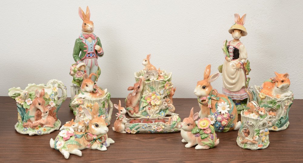 FITZ AND FLOYD RABBIT AND WOODLAND FIGURES: FITZ AND FLOYD RABBIT AND WOODLAND FIGURES: 11 pieces total to include 2 figural rabbits dressed in their finest, 4 covered jars with assorted animals, pitcher with deer, 3 rabbit figures, small fruit