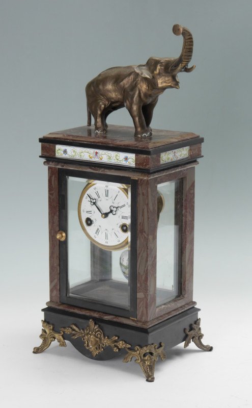 FIGURAL ELEPHANT CRYSTAL REGULATOR CLOCK: FIGURAL ELEPHANT CRYSTAL REGULATOR CLOCK: 20th century production, stone case with enameled panel inserts, patinated spelter figural elephant finial, glass windows. Enameled dial with Roman numeral, e