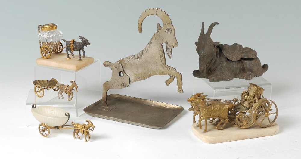 6 FIGURAL GOAT INKWELLS & OPEN SALTS: 6 FIGURAL GOAT INKWELLS & OPEN SALTS: An assembled collection of 6 pieces total, all with goat themes, to include 1) Metal cigar cutter, 7" h. x 6 1/4" x 4". 2) Cast metal inkwell with hinged lid, cop