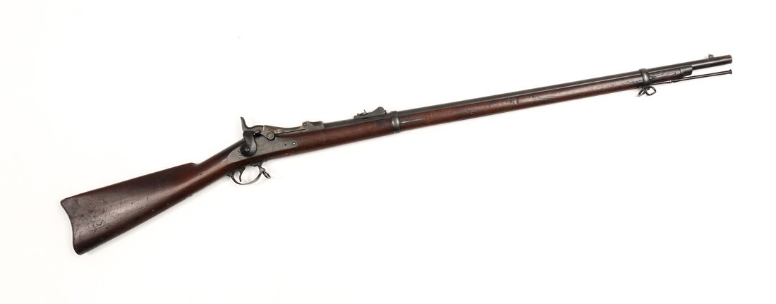 MODEL 1879 SPRINGFIELD TRAPDOOR RIFLE: MODEL 1879 SPRINGFIELD TRAPDOOR RIFLE: .45-70 caliber 32 5/8'' barrel, serial number 349477 dates to 1888, marked US Model 1873 at breech, eagle with US Springfield on lockplate. 2 inspector cartouche