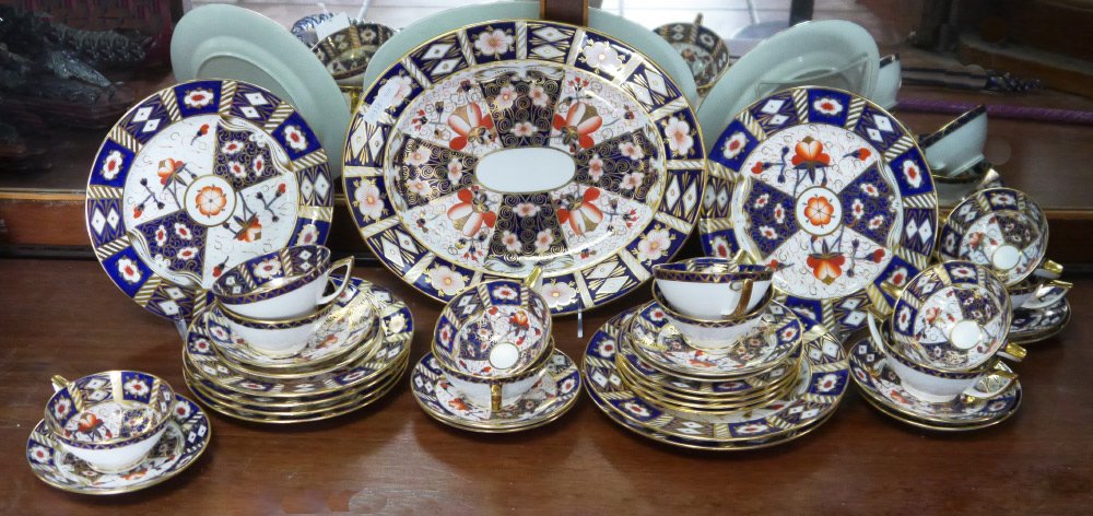 ROYAL CROWN DERBY IMARI & MINTON IMARI 35 PC CHINA: ROYAL CROWN DERBY IMARI AND MINTON FOR BIRKS, CHINA IN AN IMARI PATTERN: Pattern G6041. 35 pieces to include 4 Plates (9"), 4 plates (7 3/4"), 4 bread plates, 7 cups with saucers, 4 bouillon cups with