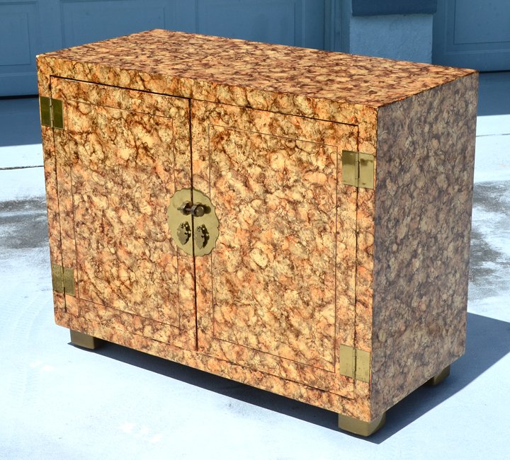 HENREDON OIL DROP FAUX TORTOISE SHELL CHEST: HENREDON OIL DROP FAUX TORTOISE SHELL CHEST: 2 door chest with faux tortoise shell design, doors with brass oriental style pulls. Interior with single drawer over shelf. 31" h. x 39" x 18".
