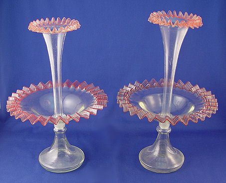 PAIR VICTORIAN ART GLASS EPERGNES: PAIR VICTORIAN ART GLASS EPERGNES: Single trumpet blown glass vases with red threading on a very faint, almost colorless yellow. 15"h, 10" dia.