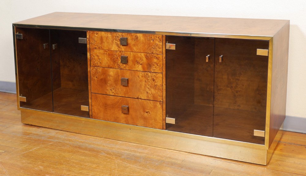 FOUNDERS BURL CREDENZA WITH SMOKE GLASS DOORS: FOUNDERS FURNITURE BURL WOOD CREDENZA: Burl veneer all over with brass accents and trim, 4 center drawers, smoke glass doors either side with illuminated interior. Marked Founders inside drawer, 29 1/