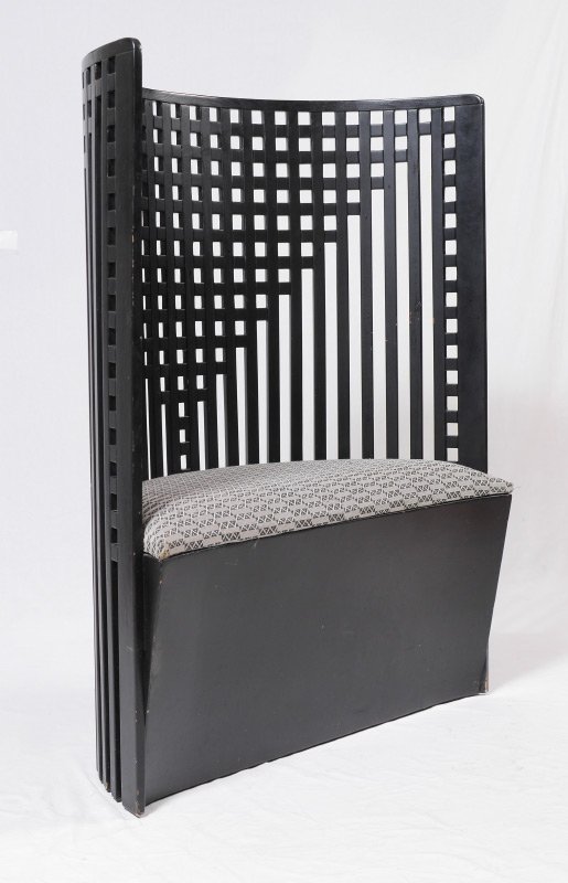 ART DECO STYLE HIGH BARREL BACK CHAIR: ART DECO STYLE HIGH BARREL BACK CHAIR: Black painted tall geometric open work barrel back. bench seat with slight concave curve to front, upholstered seat cushion. Overall measures 47 1/4'' h. x 37 1/