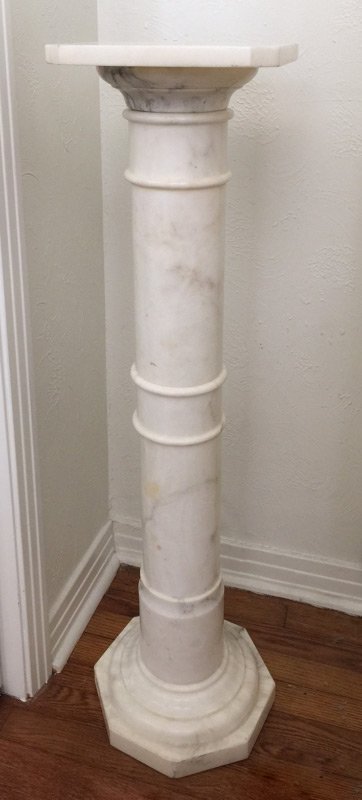 WHITE ALABASTER PEDESTAL: WHITE ALABASTER PEDESTAL: Removable square top with canted corners, solid alabaster body and octagonal base, overall 39" h. x 12".