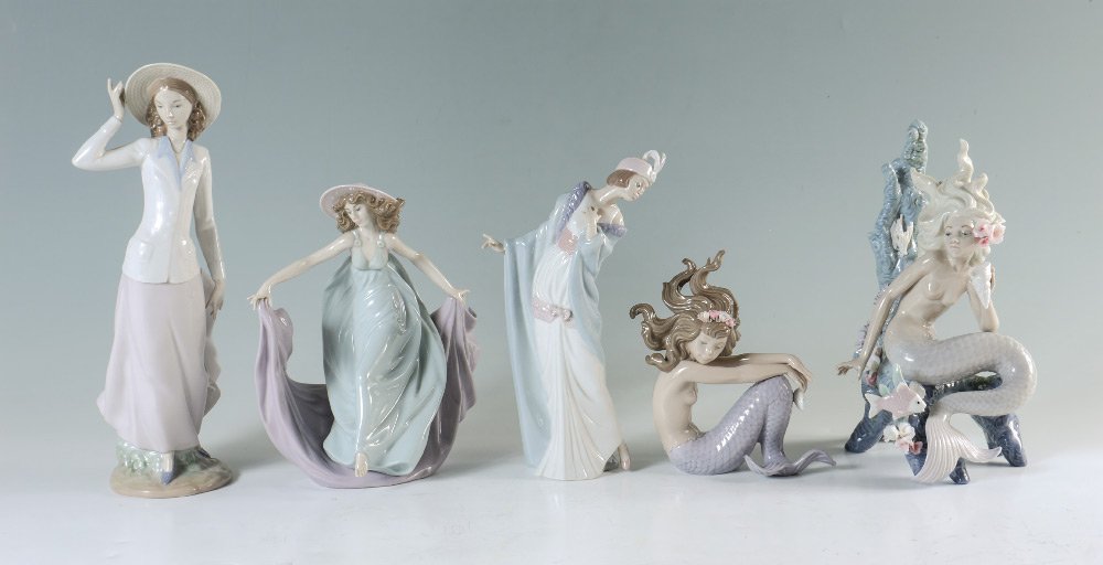 5 LLADRO FIGURINES GIRLS & MERMAIDS: LLADRO PORCELAIN FIGURINES: 5 girls to include; 1) BREEZY AFTERNOON 5682, Juan Huerta sculptor, issued 1990 retired 2005, 12"h. 2) MAY DANCE 5662, Jose Puche sculptor, issued 1990 retired 2005, 8.75"h