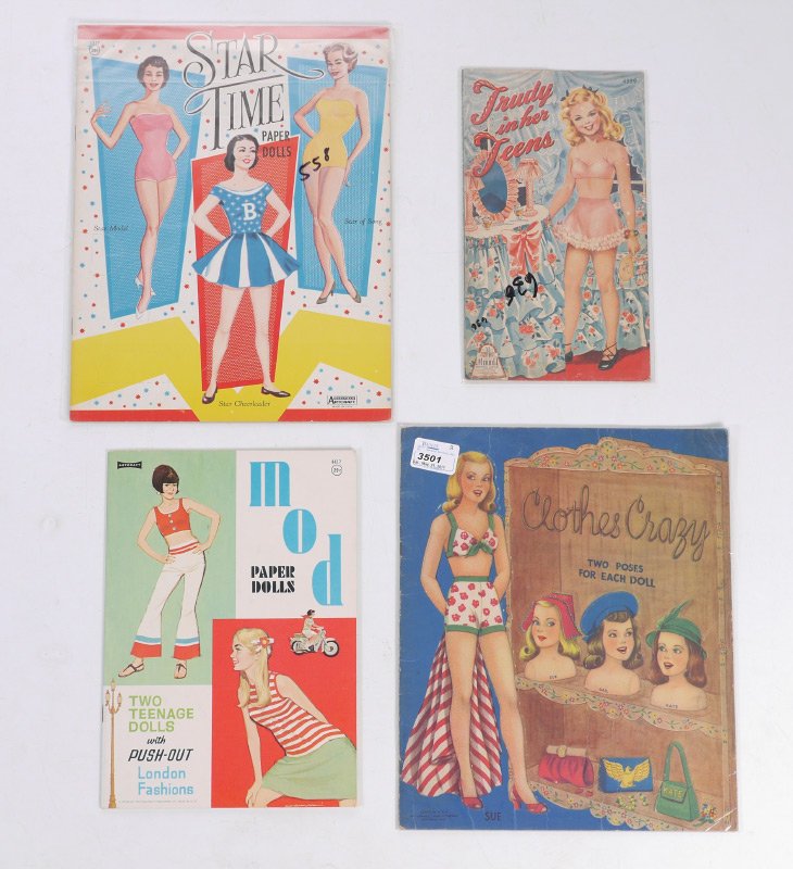 38 VINTAGE PAPER DOLL BOOKS: COLLECTION OF 38 VINTAGE PAPER DOLL BOOKS: Approx. 38 assorted paper dolls books with fashion and careers as the primary themes. Publishers to include Saalfield, Whitman, Lowe, Merrill and more.