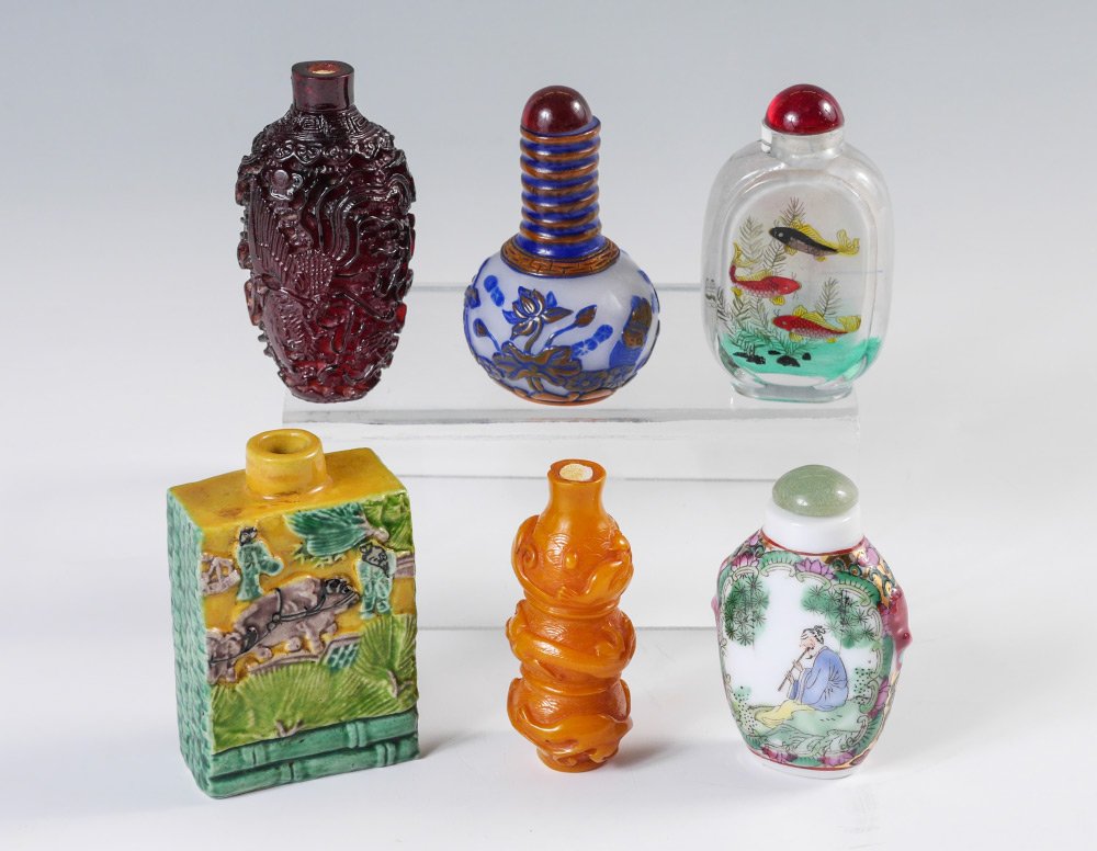 COLLECTION OF 6 CHINESE SNUFF BOTTLES: COLLECTION OF 6 CHINESE SNUFF BOTTLES: 6 assorted pieces total to include reverse painted, Peking glass, 2 carved amber?, polychrome decorated porcelain, polychrome earthenware (2 3/4" h. x 1 3/4" x 1