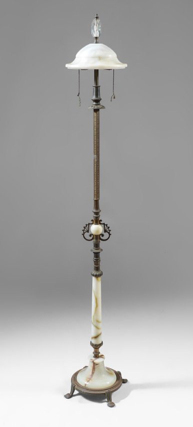 ALABASTER & BRASS 2 LIGHT FLOOR LAMP: ALABASTER & BRASS 2 LIGHT FLOOR LAMP: Embossed brass shaft with alabaster inserts, on 4 feet, double socket fixture, alabaster shade, crystal finial. Overall measures 59 1/4" h. x 12" dia.