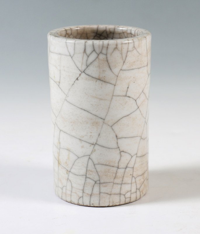 QING DYNASTY CRACKLE GLAZE BRUSH WASHER: QING DYNASTY CRACKLE GLAZE BRUSH WASHER: Mid to late 19th century, cylinder form with crackle glaze, seal mark and red mark on base. 4 3/4" h. x 3" dia.