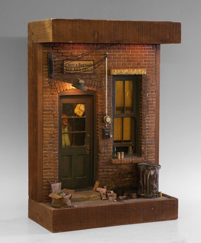 MICHAEL GARMAN LEROY & BERTHA'S BAR AND GRILL SCULPTURE: GARMAN, Michael, (American, 20th C): "Leroy & Bertha's Bar and Grill", diorama/shadowbox style sculpture depicting bar entrance including door, with older man staring out, and open window, dirty brick