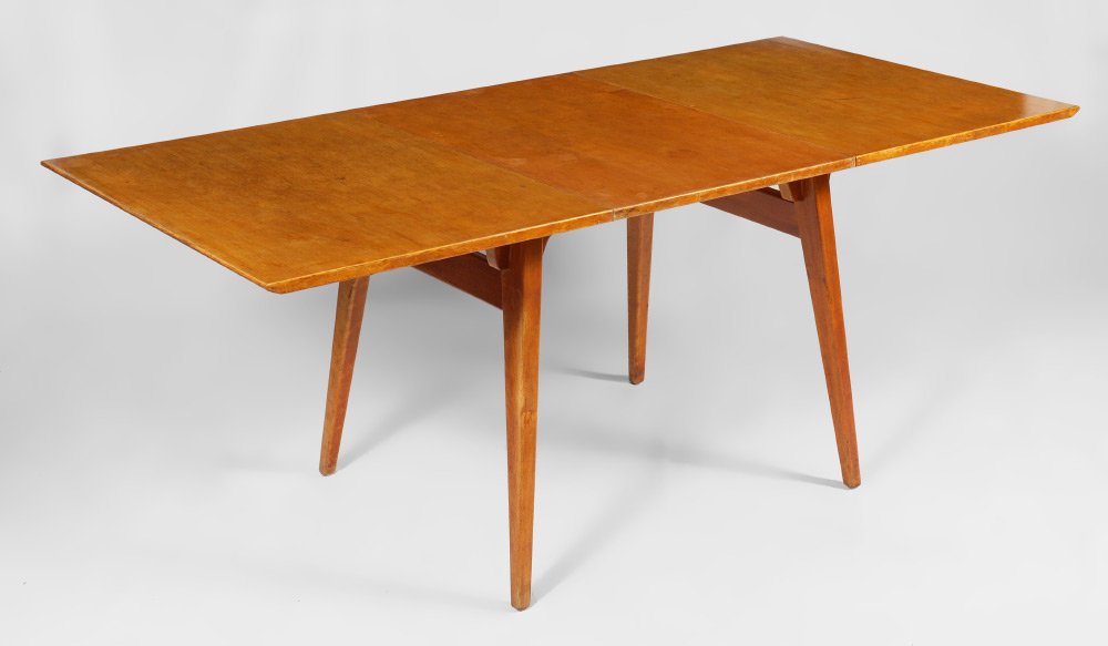 JENS RISOM DINING TABLE & LEAF: JENS RISOM DINING TABLE & LEAF: Rectangular top on 4 slightly splayed legs, single 22" leaf. Well marked with paper labels, table measures 29 1/4" x 50" x 34".