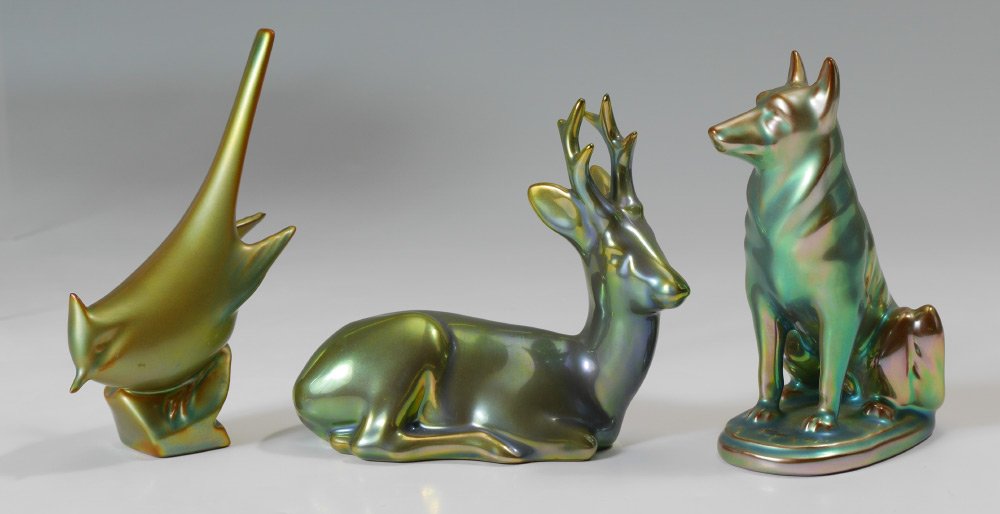 3 ZSOLNAY EOSIN FIGURES: 3 ZSOLNAY EOSIN FIGURES: 3 pieces total, all with Zsolnay marks and Eosin glaze, to include 1) German Shephard dog, 4 1/4" h. x 3 1/2". 2) Resting buck deer, 4 1/2" h. x 5 1/4". 3) Cardinal bird, 5 1/