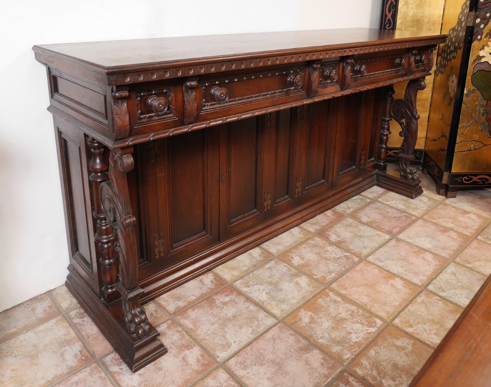 CENTURY FURNITURE GOTHIC CARVED SIDEBOARD: CENTURY FURNITURE CARVED SIDEBOARD: Gothic revival style cabinet with carved foliate scroll and paw feet supports to front, 5 drawers over 4 doors, 39 1/4" h. x 84 1/4" x 24".