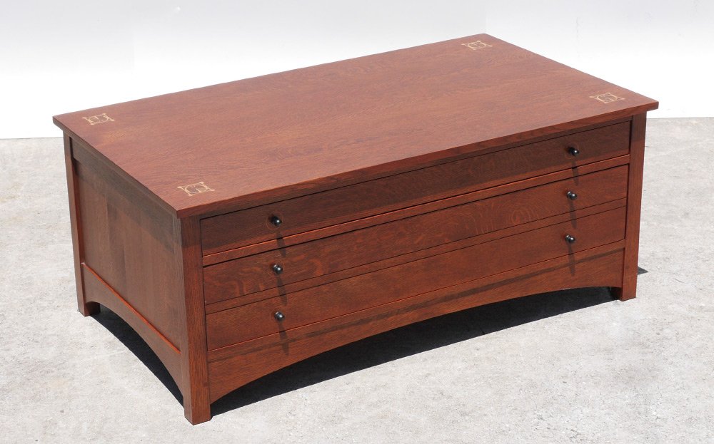 STICKLEY HARVEY ELLIS STORAGE COCKTAIL TABLE: CONTEMPORARY STICKLEY HARVEY ELLIS STORAGE COCKTAIL TABLE: Top with inlaid design at each corner, shallow drawer over deep drawer on one side, shaped skirt. Stamped Stickley with badge inside top draw