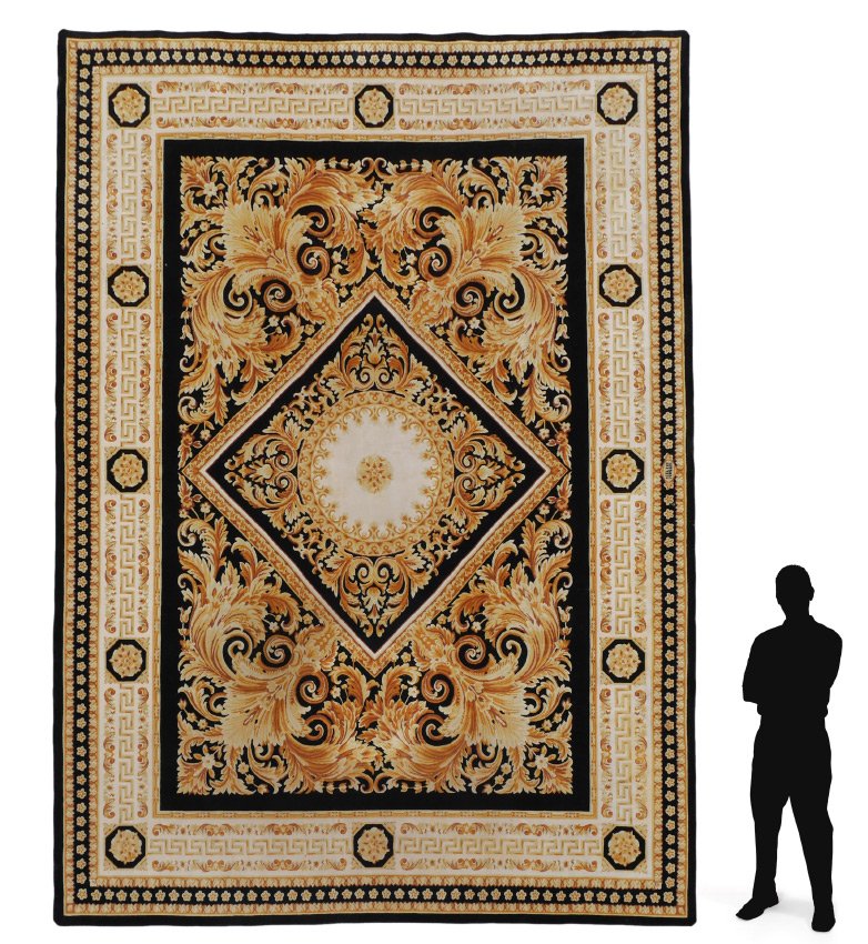 VERSACE CARPET BLACK AND GOLD 9'9" X 13': VERSACE HAND KNOTTED CARPET, 9'9" x 13': Authentic Gianni Versace Home Signature creation. Black ground with shades of gold and cream, acanthus leaf, floral and Greek key motifs to central medallion,