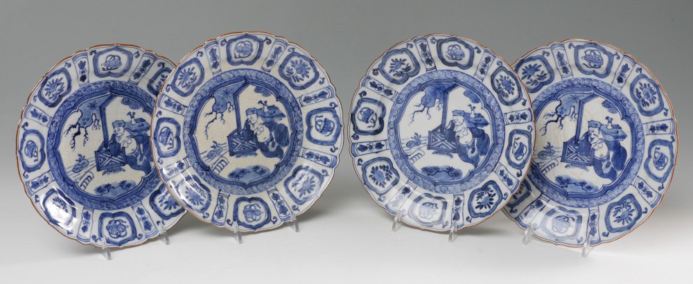 4 PIECE CHINESE BLUE & WHITE DECORATED PLATES: 4 PIECE CHINESE BLUE & WHITE DECORATED PLATES: 4 matching plates, center genre scene of man reclining, fluted rim with alternating panels, chop marks on base. 8 1/2" dia.