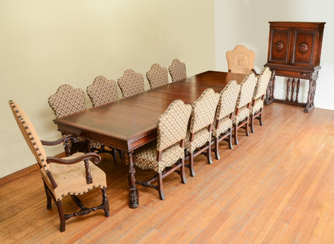 CENTURY FURNITURE GOTHIC CARVED DINING ROOM TABLE: MAJOR THOMAS BAYLESS CENTURY FURNITURE CARVED DINING ROOM SUITE: Gothic revival style by Century Furniture. 14 piece set to include, TABLE with carved foliate scroll and paw feet legs, turned column c
