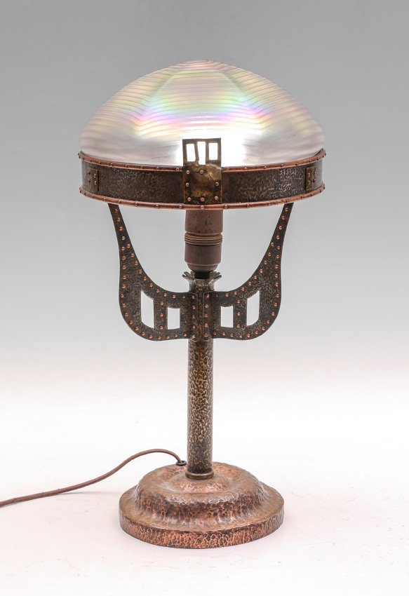 GOTHIC REVIVAL COPPER LAMP & AUSTRIAN GLASS SHADE: GOTHIC REVIVAL COPPER LAMP WITH AUSTRIAN GLASS SHADE: Hammered copper lamp base with a distinctive gothic revival appearance, single socket, 16 1/2" h. x 10" dia. Sold with a married Austrian iridesce