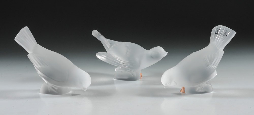 3 LALIQUE CRYSTAL MOINEAU SPARROW BIRD FIGURES: 3 LALIQUE CRYSTAL MOINEAU SPARROW BIRD FIGURES: 3 pieces total to include 1) Frosted sparrow with wings spread, 3 1/4" h., original box 4" h. x 7 1/4" x 5 3/4". 2-3) Frosted sparrows with head down, 3