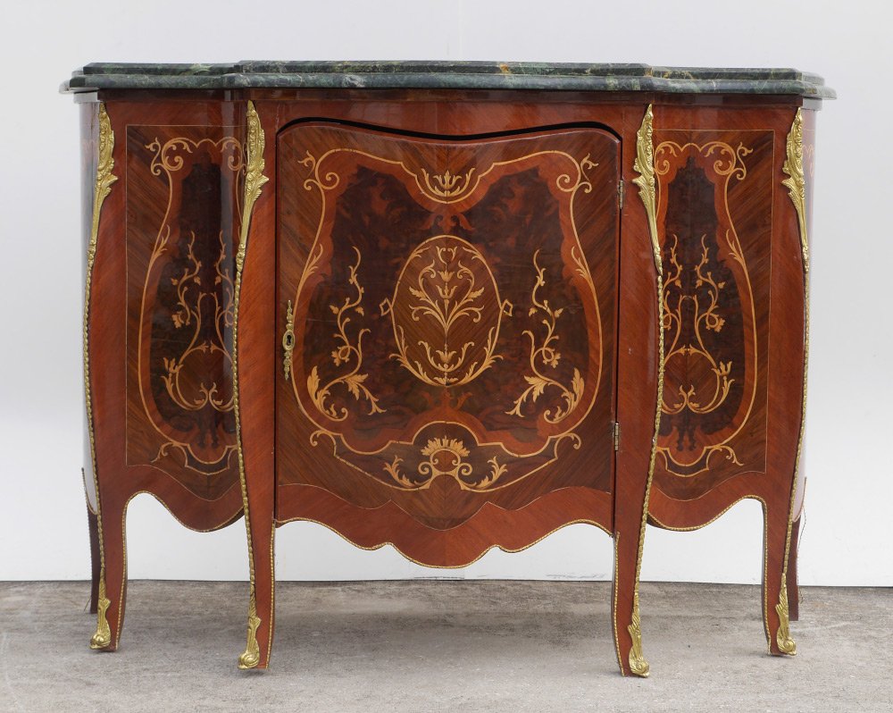 MARQUETRY INLAID MARBLE TOP COMMODE: MARQUETRY INLAID MARBLE TOP COMMODE: 20th century, shaped green variegated marble top, serpentine single door front with floral motif marquetry inlaid panels. Gilt metal accents, overall 36 1/2" h. x 