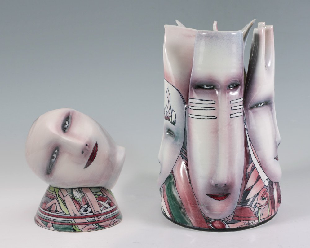 2 BING GLEITSMAN PORCELAIN FACE SCULPTURES: 2 BING GLEITSMAN PORCELAIN FACE SCULPTURES: 2 pieces total by artist Bing Gleitsman to include 1) Tall vase with 4 figural faces, signed Bing 1998. 14 1/2" h. x 9". 2) Resting figural head, signed Bin