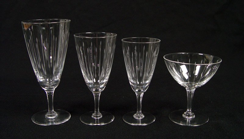 VAL ST LAMBERT CRYSTAL STEMWARE 32 PC: VAL ST LAMBERT CRYSTAL STEMWARE: 32 piece etched stems to include 10 water goblets (6 3/4"), 10 sherbets / champagnes (4 3/8"), 8 wine (5 7/8"), 4 wine (5 1/2"). Signed.