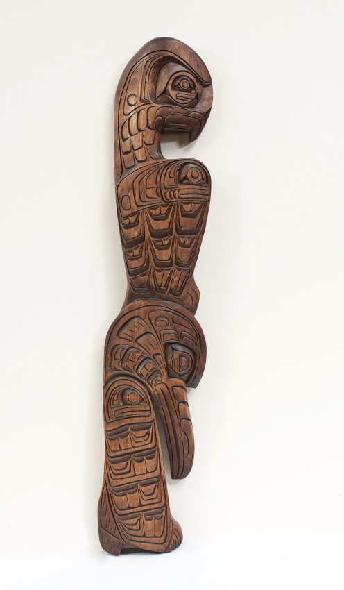 JACKSON ROBERTSON KWAKIUTL WALL TOTEM CARVING: ROBERTSON, Jackson, (Canadian, 20th Century): Kwakiutl Northwest Coast wall totem carving, figures to include ''Moon in Eye'' Eagle, Killer Whale, ''Moon in Eye'' Raven and Salmon. Unpainted, signed o