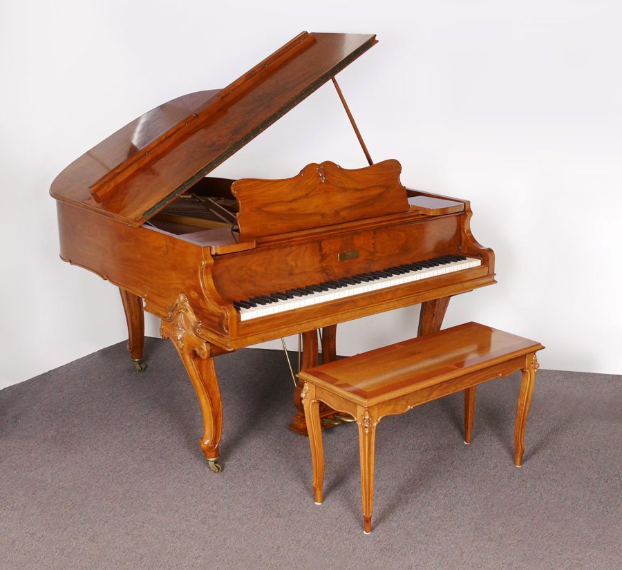 KNABE BURL WALNUT BABY GRAND PIANO: KNABE BURL WALNUT BABY GRAND PIANO: Serial number 86160, dates to 1919, book matched burl walnut veneer case. Carved legs on brass castors, carved pedestal stand. Overall measures 38 1/2'' x 62'' x 54