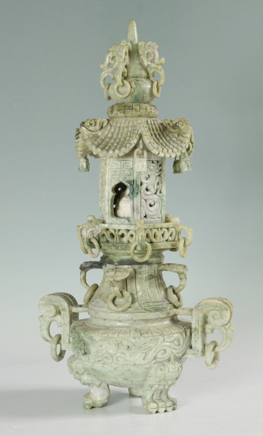CHINESE CARVED STONE BUDDHIST TEMPLE CENSER: CHINESE CARVED STONE BUDDHIST TEMPLE CENSER: In 3 levels, top level with open work pagoda shape with hanging bells. Middle level with white stone carved figure of a seated Buddha, lower level tri-foot
