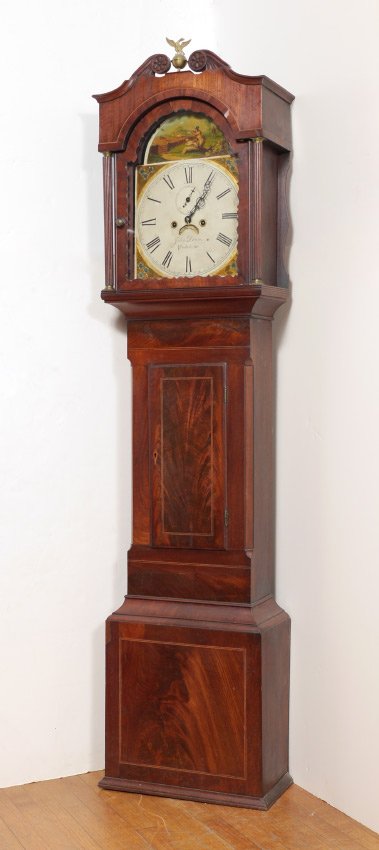 JOHN DOWN MAHOGANY LONGCASE CLOCK: JOHN DOWN MAHOGANY LONGCASE CLOCK: Early to mid 19th century, bonnet with broken arch pediment, center brass eagle on ball finial, fluted full columns, shaped bezel on front glass. Mahogany body and b
