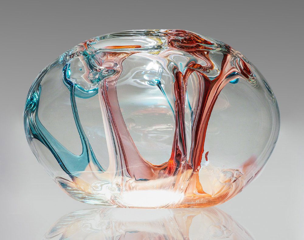 PETER BRAMHALL LARGE BLOWN ART GLASS ORB: BRAMHALL, Peter, (American, 20th Century): Large blown glass orb with red, white and blue interior striations, titled ''Ocean Sunsets''. Signed on base ''Peter Bramhall, October, 1988, Help from Andy