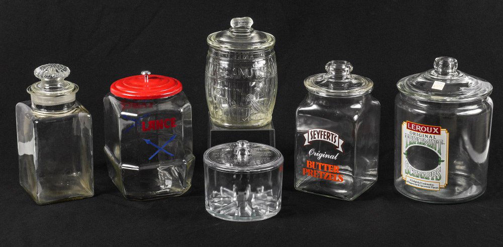 COLLECTION OF VINTAGE COUNTRY STORE JARS: COLLECTION OF VINTAGE COUNTRY STORE JARS: 6 piece collection of counter top jars to include 1) Molded Planters barrel advertising jar with peanut finial on lid, 10 1/2'' h. x 7''. 2) LeRoux Triplemint