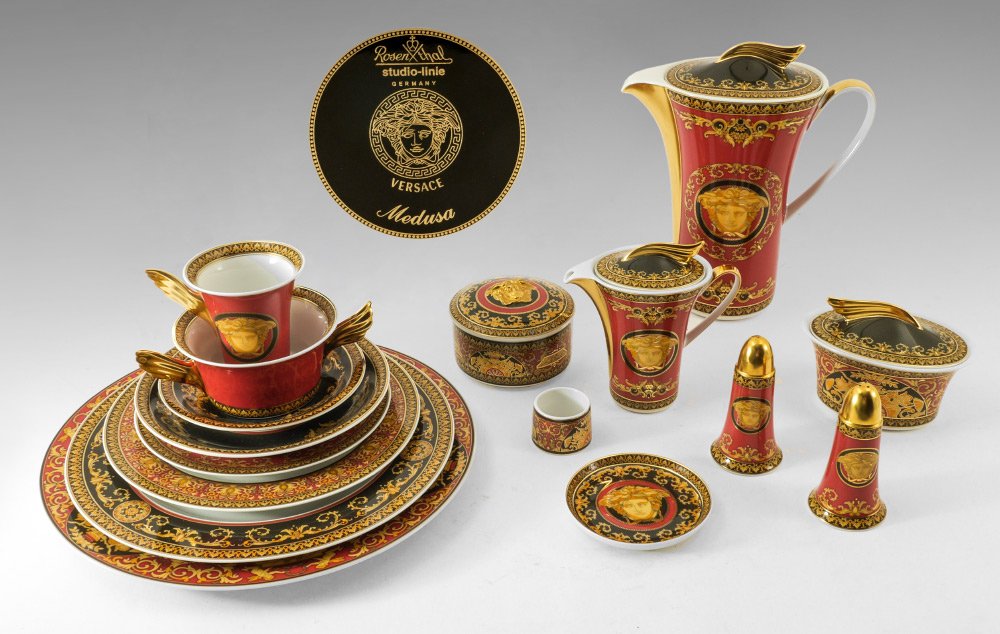 ROSENTHAL VERSACE MEDUSA RED CHINA 115 PC SERVICE 12: ROSENTHAL VERSACE MEDUSA RED DINNER SERVICE: Service for 12 plus serving pieces, 115 pieces total. Service Plates 12"; Dinner Plates 10.75" one with a chip; Salad Plates 9"; Bread & Butter Plates 7";