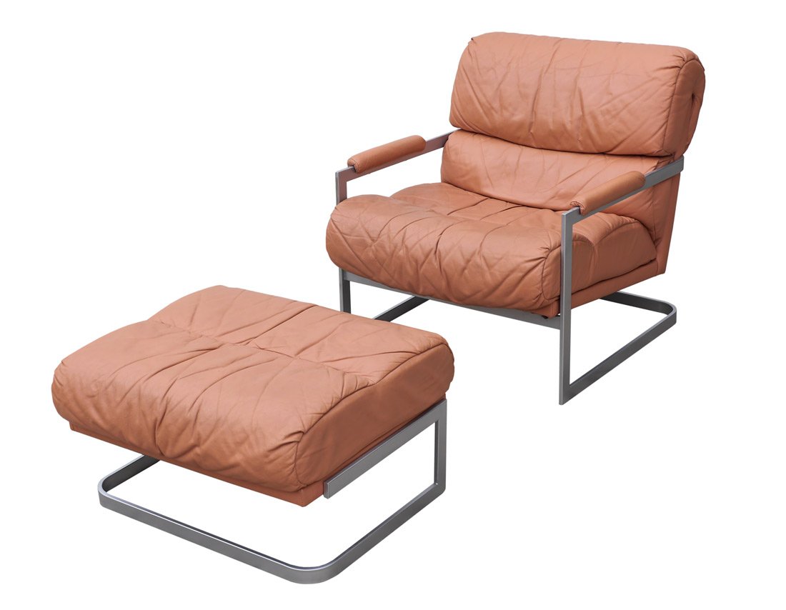 MID-CENTURY MILO BAUGHMAN STYLE CHAIR AND OTTOMAN: MID-CENTURY MILO BAUGHMAN STYLE CHAIR AND OTTOMAN: Bent steel frames, pink leather upholstery, unmarked. Chair measures 32 1/4'' h. x 38'' x 31 1/2''. ottoman 16'' x 29'' x 21 1/2''.