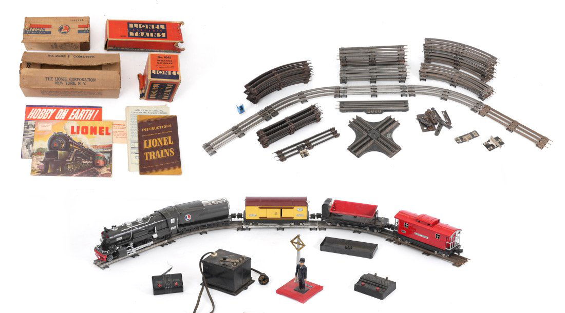 LIONEL 263E GUN METAL ENGINE & TENDER TRAIN SET: LIONEL 263E GUN METAL ENGINE & TENDER TRAIN SET: Part of a 5 car set with transformer, track, rare Switchman and more! To include Lionel 2-4-2 engine #263E, 2263W tender, 2814 automobile / furniture b