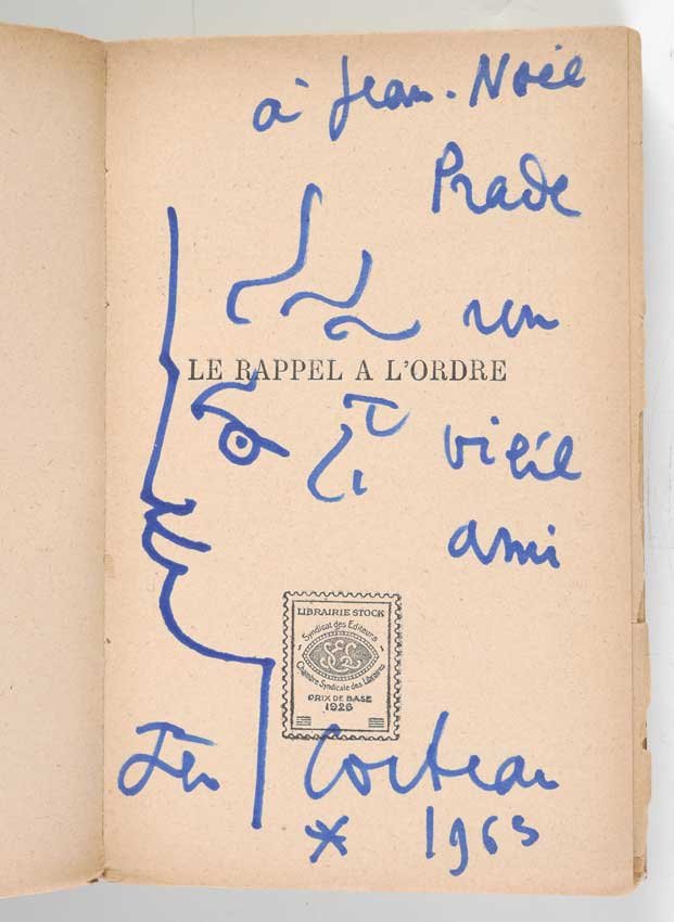 JEAN COCTEAU ORIGINAL DRAWING IN HIS BOOK: COCTEAU, Jean, (French 1889-1963): Original marker drawing inside of a paperback volume of his book ''Le Rappel a L'Order'', dedicated to Jean-Noel Prade, published 1926, Paris. Measures 7 1/2'' x 5''