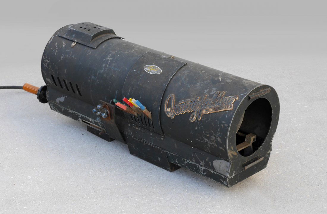 1950'S VINTAGE CAPITAL QUARTZ FOLLOW SPOTLIGHT: 1950'S VINTAGE CAPITAL QUARTZ FOLLOW SPOTLIGHT: "Quartz Follow" model stage / spot light by Capital Stage Lighting Co.. Painted metal case, yellow Bakelite adjuster knob. Color and blackout gel levers