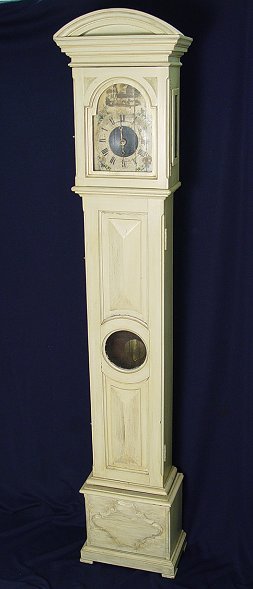 19th C GRANDMOTHERS CLOCK: 19th C GRANDMOTHERS CLOCK: 2 weights, pendulum. Don't let the later painted finish fool you, this is an old clock. Under the paint is a dark wood. The face has a worn hand painted design, the weights