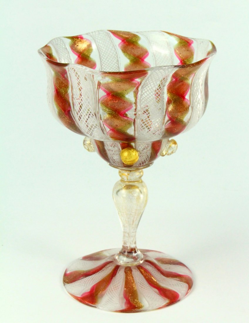 Venetian MURANO Thin-Walled Hand Blown Red & Gold Glass: Chalice or wine glass, made of the finest hand blown multi-colored glass. Thin-walled, exceptional craftsmanship. Alternating red/gold and lattice stitched patterns with gold flakes. Murano glass from